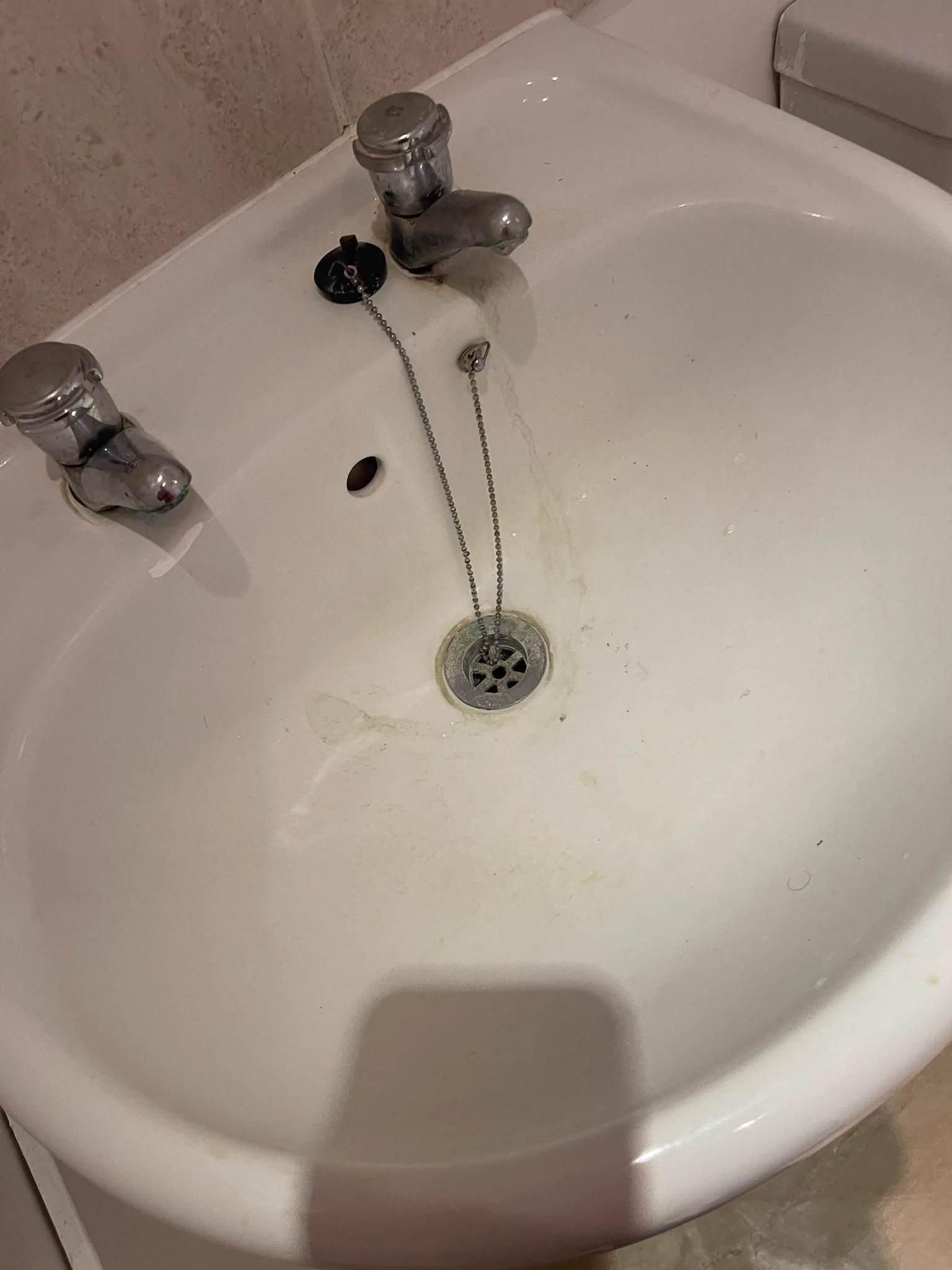 Before: Kitchen sink and tap descaled