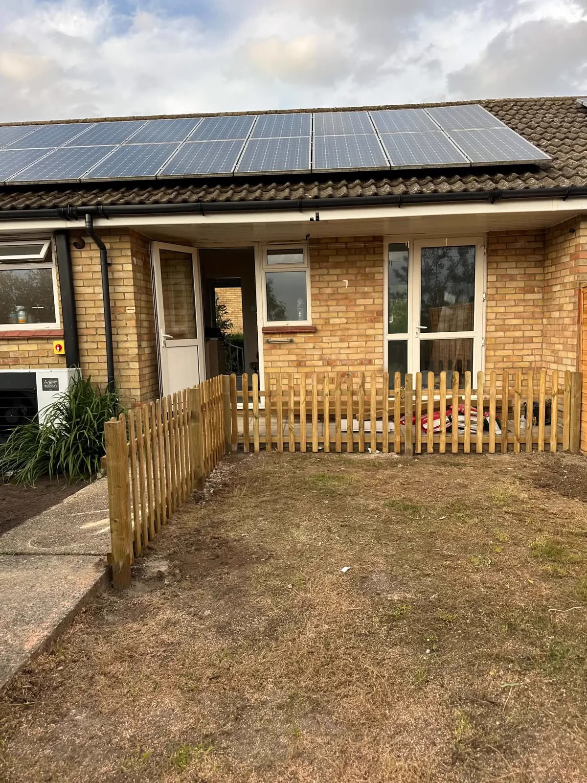 New wooden garden fence
